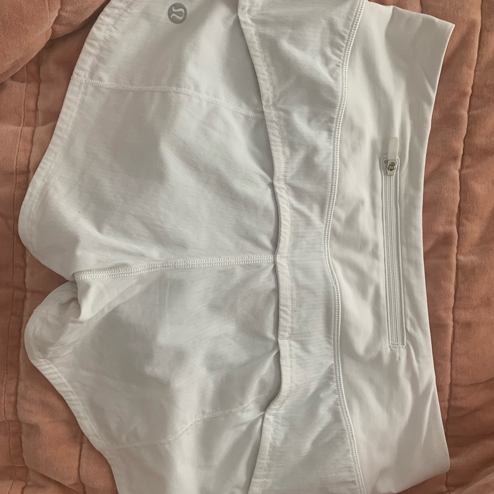 White Speed Up 2.5” inch low-rise Lululemon shorts in a size 2, used.